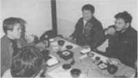 [Hiroyuki Yamaga (middle), Takami Akai (left) and Hideaki Anno (right) eating at a restaurant and discussing Yasuhiro Takeda & Gainax with unnamed interview (Yasuhiro Kamimura?), c 2000? —Editor]